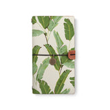 the front top view of midori style traveler's notebook with Green Leaves design